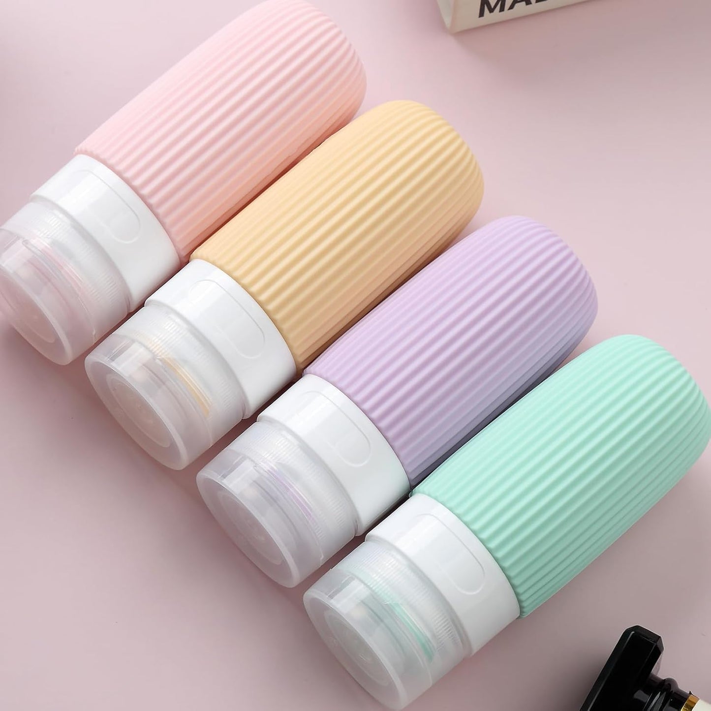 Travel Bottles for Toiletries, Tsa Approved 2oz Travel Bottles, BPA Free Leak Proof Travel Size Toiletry Containers, Refillable Travel Accessories with Toiletry Bag for Shampoo Liquid (4 Pack)