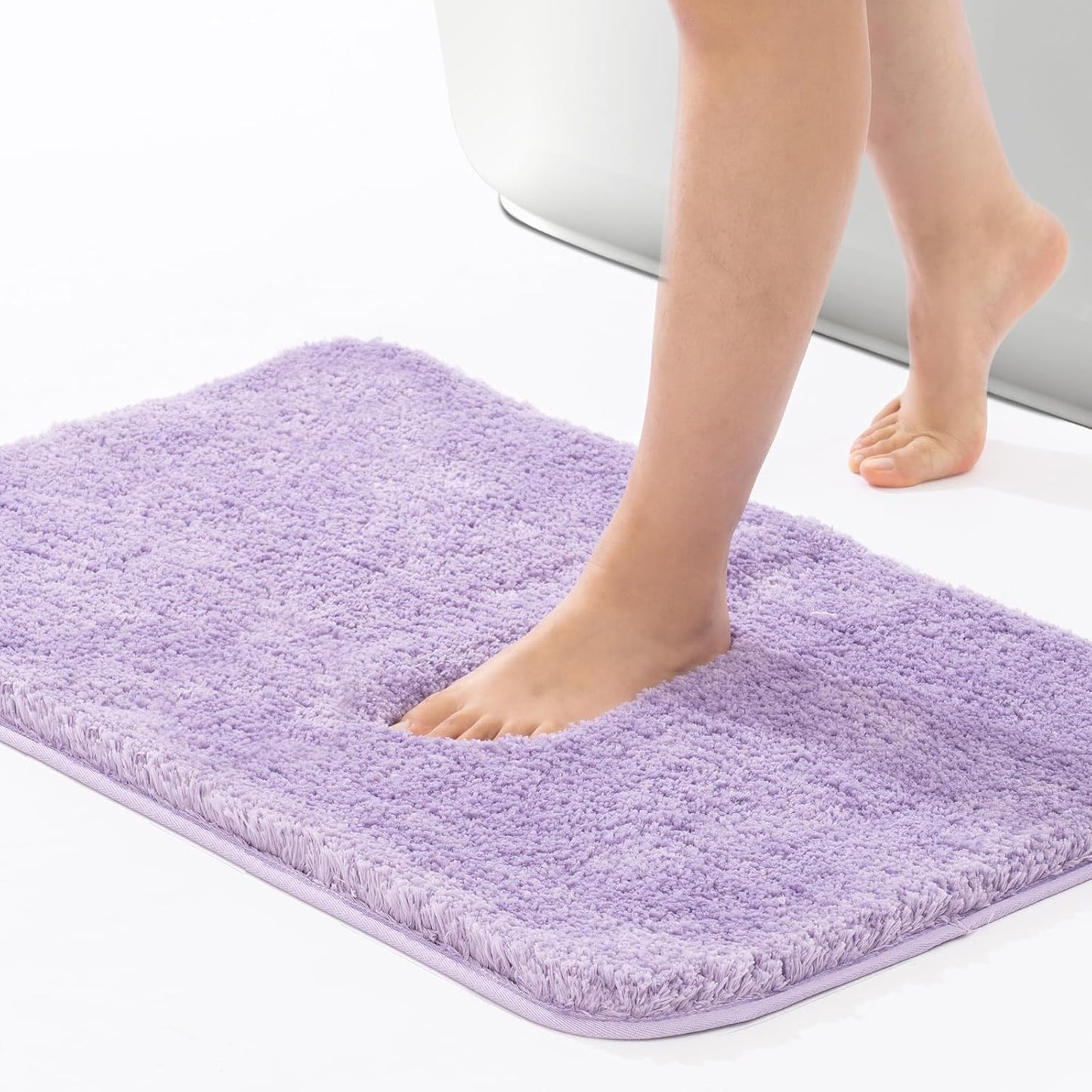 ROSMARUS Shaggy Non-Slip Bath Mat 24" x 36", Water-Absorbent Plush Bathtub Mat, Soft, Machine Washable, Purple
