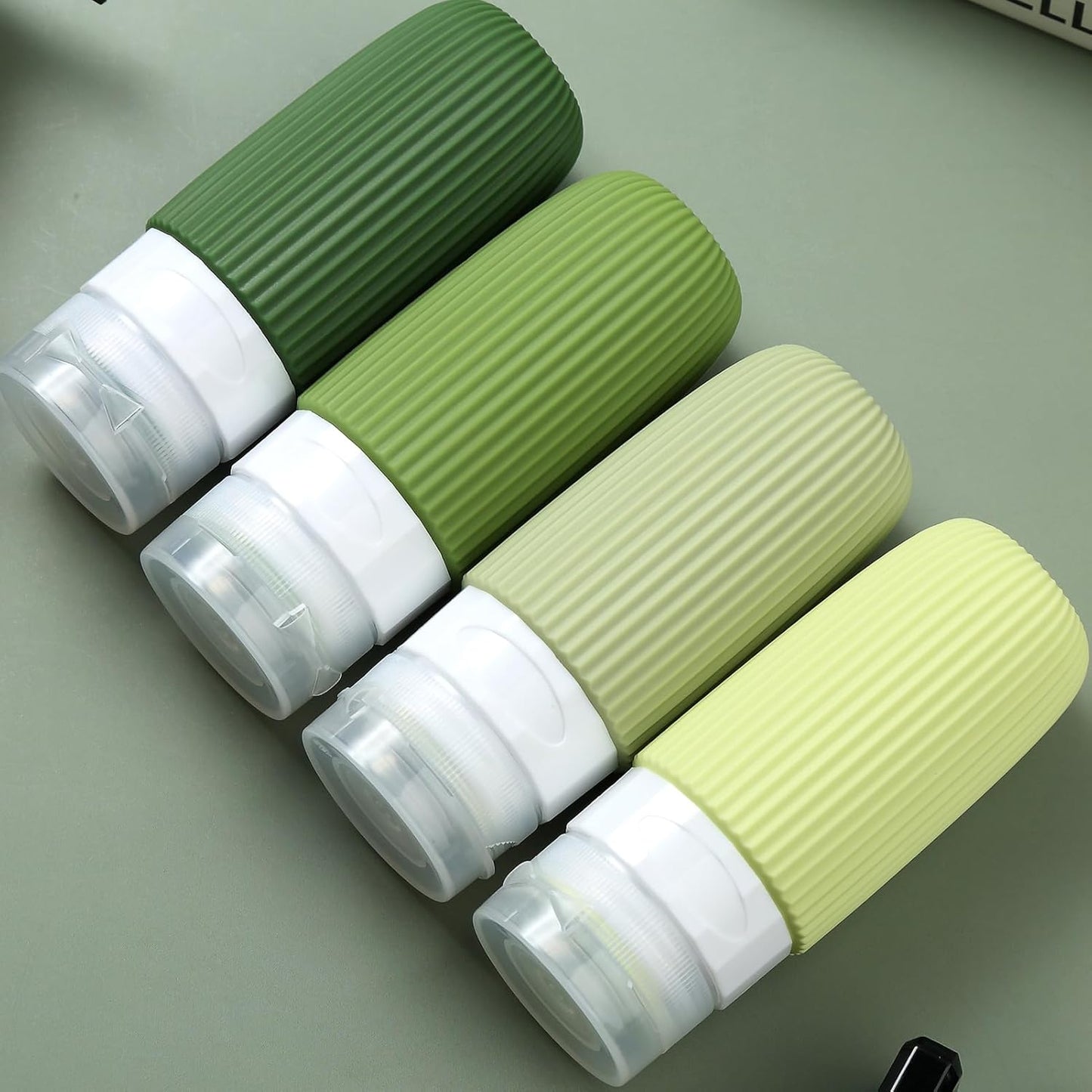 Travel Bottles for Toiletries, Tsa Approved 2oz Travel Bottles, BPA Free Leak Proof Travel Size Toiletry Containers, Refillable Travel Accessories with Toiletry Bag for Shampoo Liquid (4 Pack)