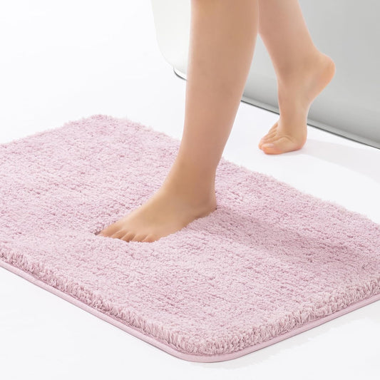 ROSMARUS Shaggy Non Slip Bath Mat, 17" X 24", Water Absorbent, Soft Tub & Floor Mat, Fluffy Machine Washable, Mauve Pink